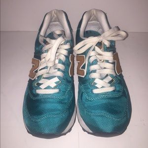 Size 7 Women’s New Balance 574 Sneakers.